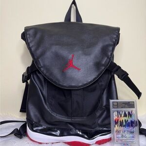 Jordan Black Backpack with Red Jumpman Accent